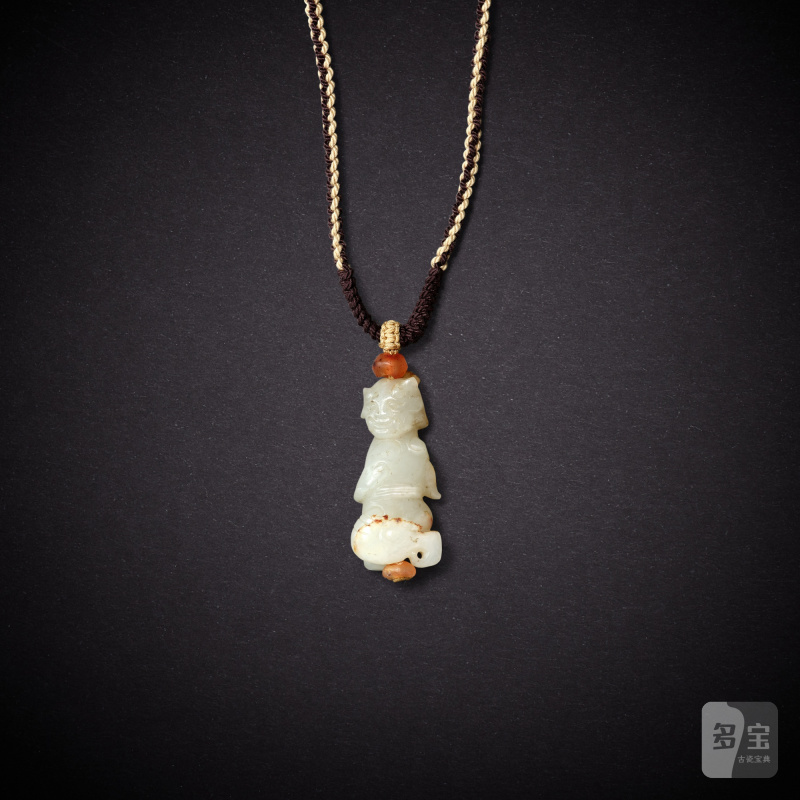 A white jade 'figure' pendant, Liao dynasty | 遼 白玉人像墜